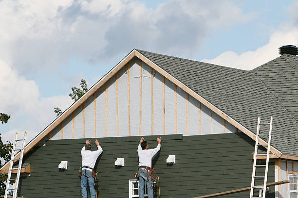 Professional Siding technician working in Columbia, IL